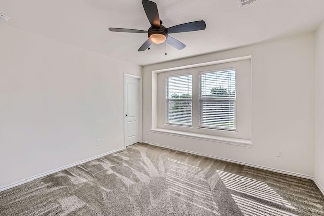 1161 Verna Brooks Way, Kyle, TX 78640 - carpeted spare room featuring ceiling fan and baseboards