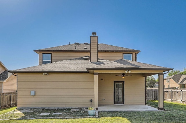 1161 Verna Brooks Way, Kyle, TX 78640 - back of property with ceiling fan, a patio area, and a chimney