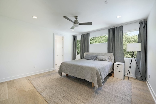 903 W Gibson St, Austin, TX 78704 - bedroom with multiple windows, light wood-style flooring, baseboards, recessed lighting, and ceiling fan