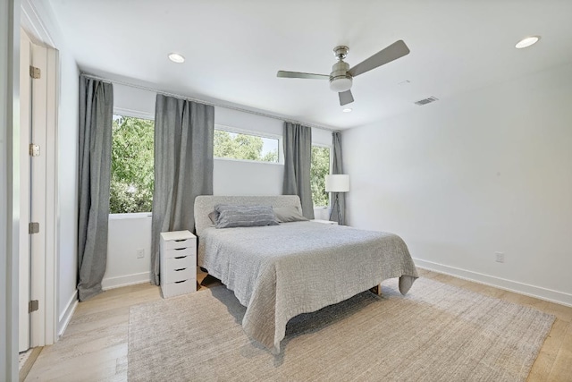 903 W Gibson St, Austin, TX 78704 - bedroom featuring light wood-style flooring, a ceiling fan, baseboards, and recessed lighting
