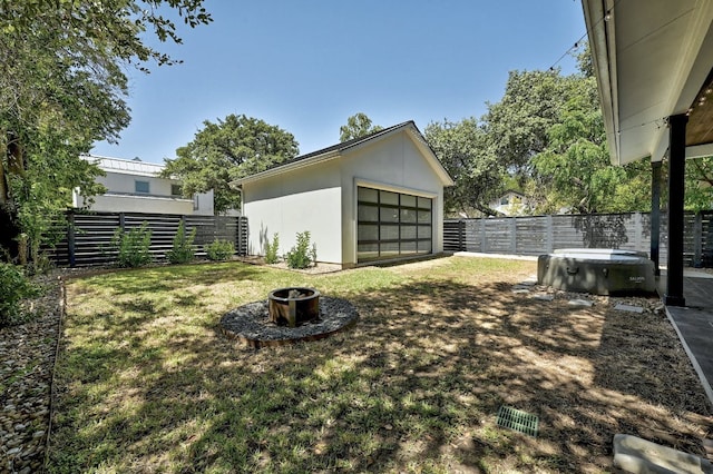 903 W Gibson St, Austin, TX 78704 - view of yard with a garage and a fire pit