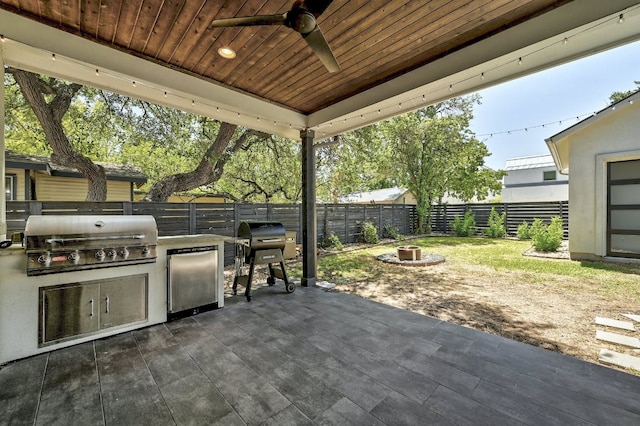 903 W Gibson St, Austin, TX 78704 - fenced backyard featuring ceiling fan and a patio