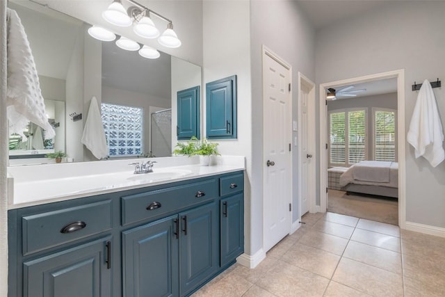 1218 Swenson Farms Blvd, Pflugerville, TX 78660 - bathroom with vanity, baseboards, a walk in shower, ceiling fan, and ensuite bath