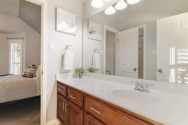 ensuite bathroom featuring vanity and ensuite bath