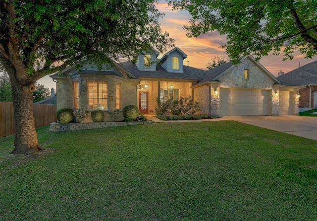 1218 Swenson Farms Blvd, Pflugerville, TX 78660 - view of front of house with stone siding, an attached garage, and concrete driveway