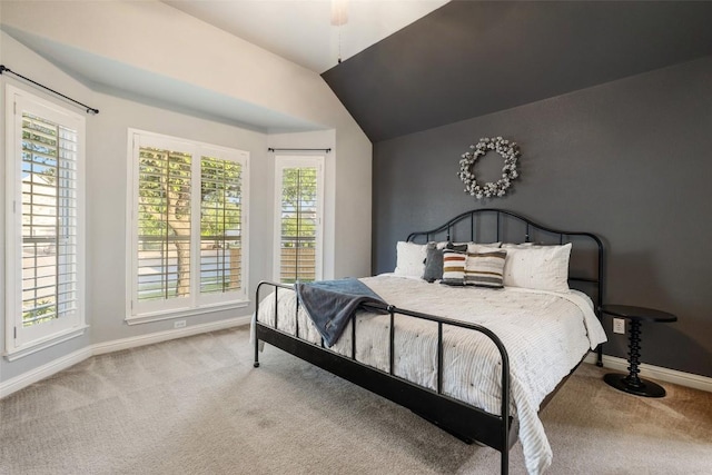 1218 Swenson Farms Blvd, Pflugerville, TX 78660 - carpeted bedroom featuring multiple windows, baseboards, and lofted ceiling