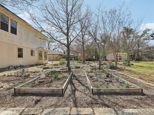 view of yard featuring a vegetable garden