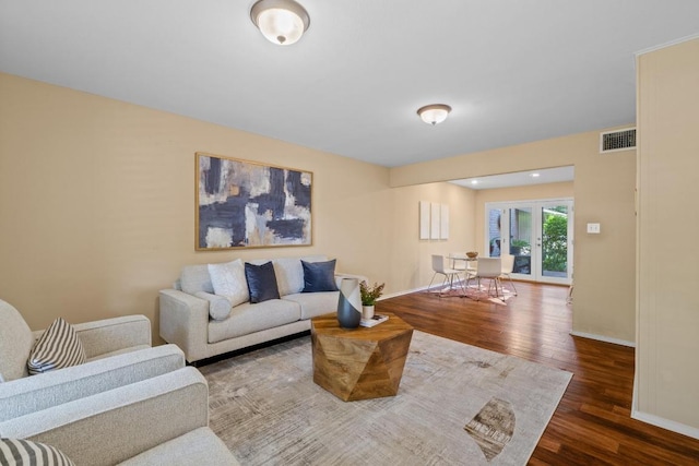 8112 W Ct, Austin, TX 78759 - living area featuring wood finished floors, french doors, and baseboards