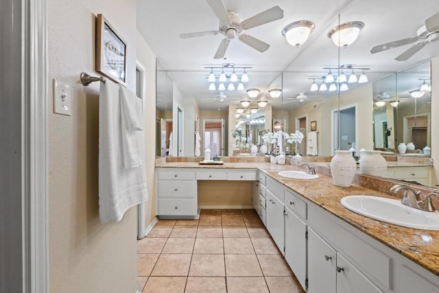 8112 W Ct, Austin, TX 78759 - bathroom with ceiling fan, tile patterned floors, and vanity
