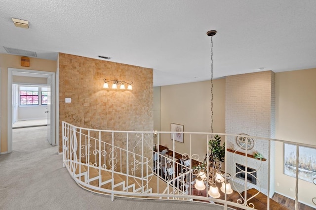 8112 W Ct, Austin, TX 78759 - hall featuring carpet floors and an upstairs landing