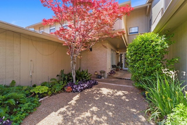 8112 W Ct, Austin, TX 78759 - view of exterior entry featuring brick siding