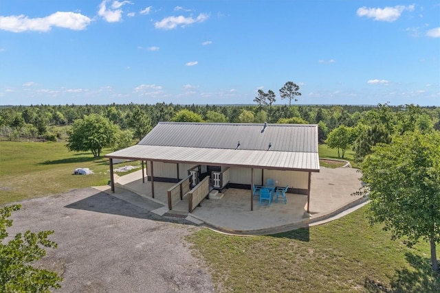 459 Mcallister Rd, Bastrop, TX 78602 - aerial view of property and surrounding area with a heavily wooded area