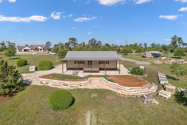 459 Mcallister Rd, Bastrop, TX 78602 - back of house featuring a lawn and a porch