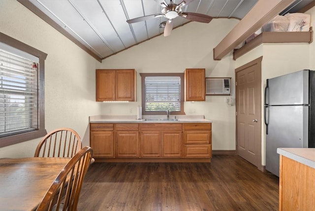 459 Mcallister Rd, Bastrop, TX 78602 - kitchen with freestanding refrigerator, lofted ceiling, a sink, dark wood-type flooring, and ceiling fan