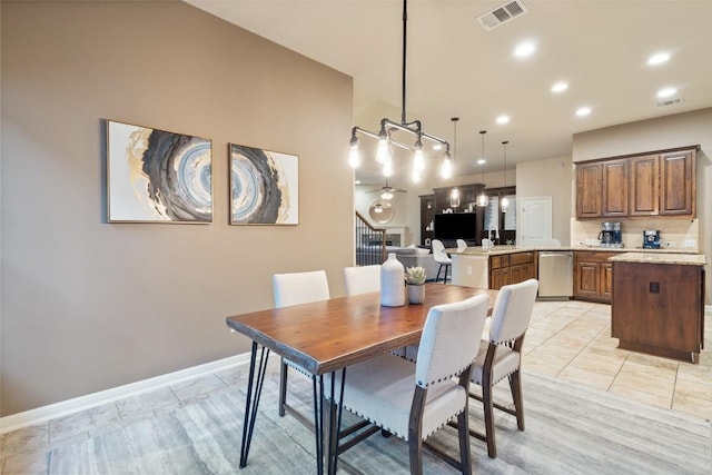 dining space featuring light tile patterned flooring, a ceiling fan, visible vents, and recessed lighting
