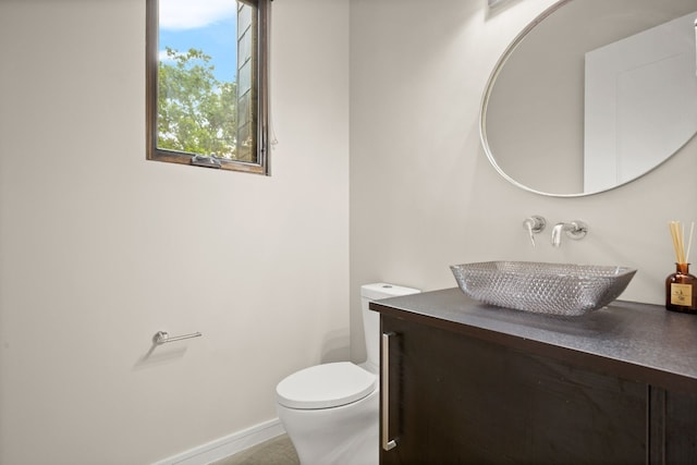500 Laurel Valley Rd, West Lake Hills, TX 78746 - half bath featuring vanity, toilet, and baseboards