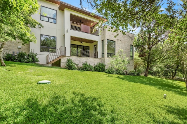 500 Laurel Valley Rd, West Lake Hills, TX 78746 - back of property with a balcony, ceiling fan, a yard, and stucco siding