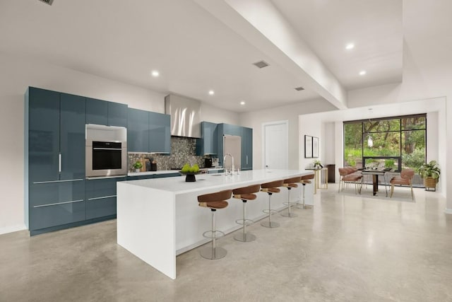 500 Laurel Valley Rd, West Lake Hills, TX 78746 - kitchen featuring oven, concrete flooring, decorative backsplash, modern cabinets, and recessed lighting