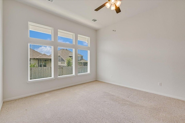 136 Gamble St, Buda, TX 78610 - carpeted empty room with a ceiling fan and baseboards