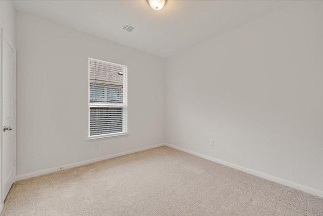 136 Gamble St, Buda, TX 78610 - carpeted empty room with baseboards