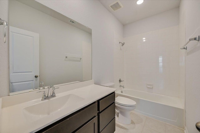 136 Gamble St, Buda, TX 78610 - bathroom featuring vanity, tile patterned floors, and shower / tub combination