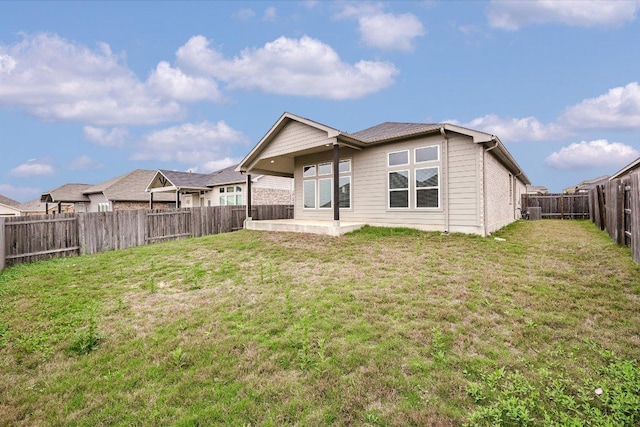 136 Gamble St, Buda, TX 78610 - back of property featuring a fenced backyard