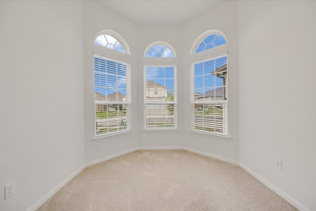 136 Gamble St, Buda, TX 78610 - carpeted spare room featuring baseboards