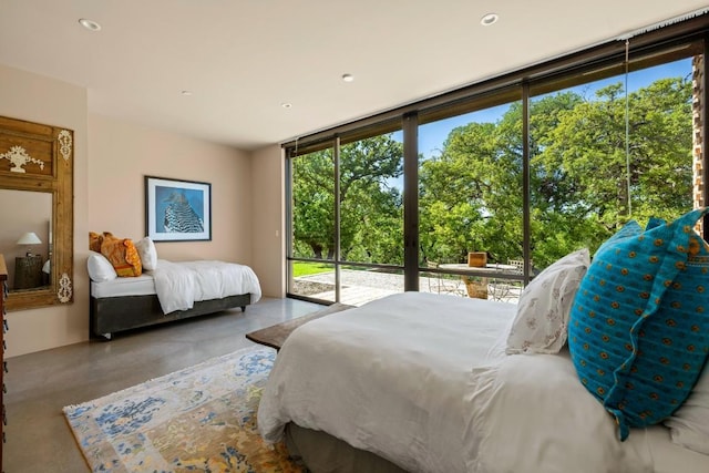 115 Seale Hill Rd, Comfort, TX 78013 - bedroom featuring finished concrete flooring and access to exterior