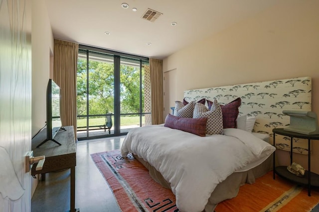 115 Seale Hill Rd, Comfort, TX 78013 - bedroom featuring expansive windows, access to exterior, and recessed lighting
