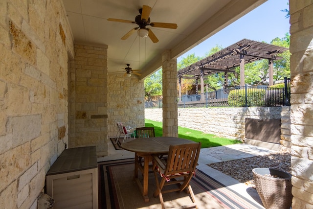 view of patio / terrace with a pergola, outdoor dining area, ceiling fan, and fence