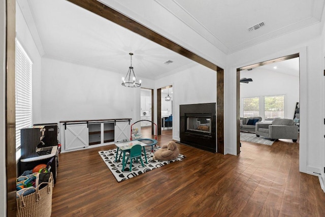 213 Pecan Meadow Ln, Harker Heights, TX 76513 - living area featuring visible vents, a multi sided fireplace, a chandelier, and wood finished floors