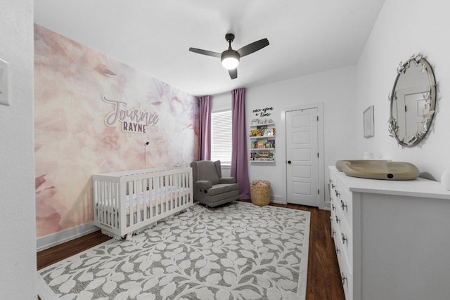 213 Pecan Meadow Ln, Harker Heights, TX 76513 - bedroom with a nursery area, baseboards, a ceiling fan, and wood finished floors
