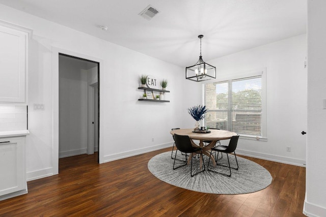 213 Pecan Meadow Ln, Harker Heights, TX 76513 - dining space featuring dark wood-type flooring, visible vents, baseboards, and an inviting chandelier