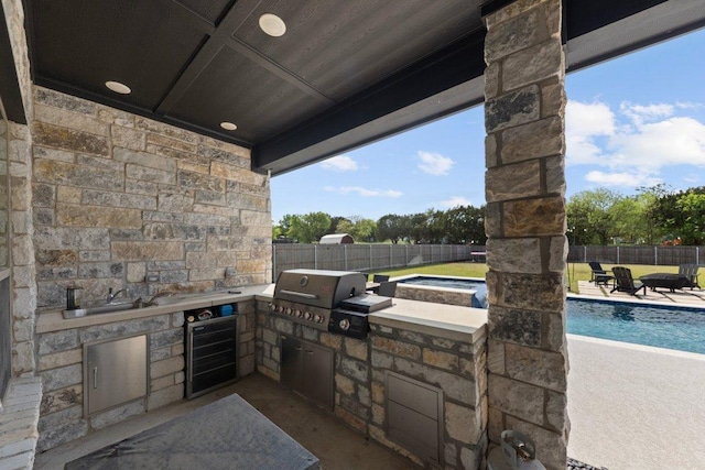 213 Pecan Meadow Ln, Harker Heights, TX 76513 - view of patio / terrace featuring grilling area, a fenced backyard, area for grilling, and wine cooler