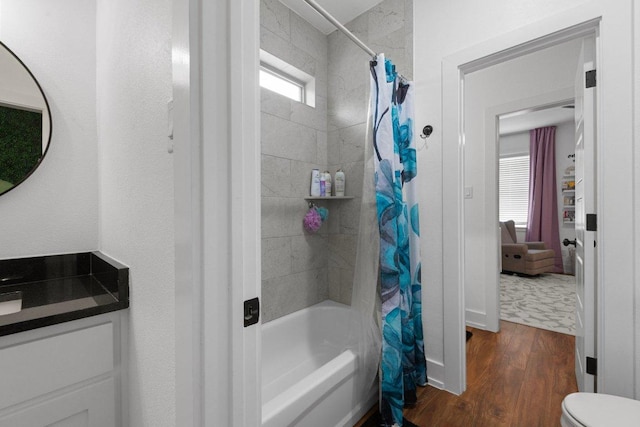 213 Pecan Meadow Ln, Harker Heights, TX 76513 - bathroom with toilet, vanity, wood finished floors, and shower / bath combination with curtain