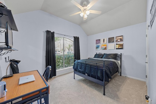bedroom featuring ceiling fan, carpet flooring, baseboards, and lofted ceiling