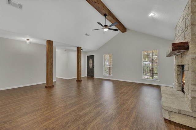 unfurnished living room featuring beamed ceiling, ceiling fan, dark wood-style flooring, a fireplace, and visible vents