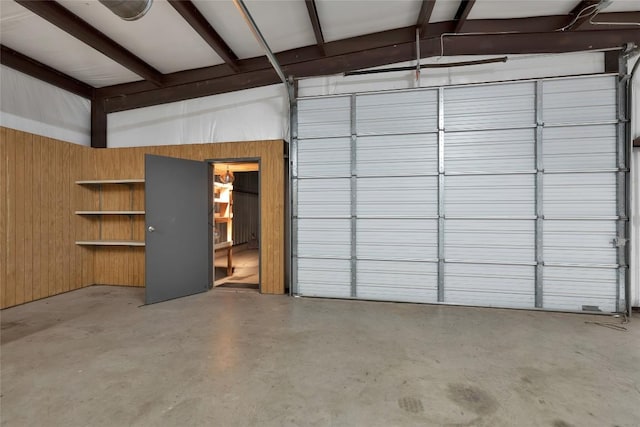garage with wood walls