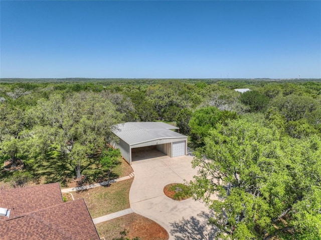 bird's eye view featuring a view of trees