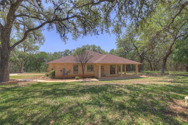 ranch-style home with a front yard