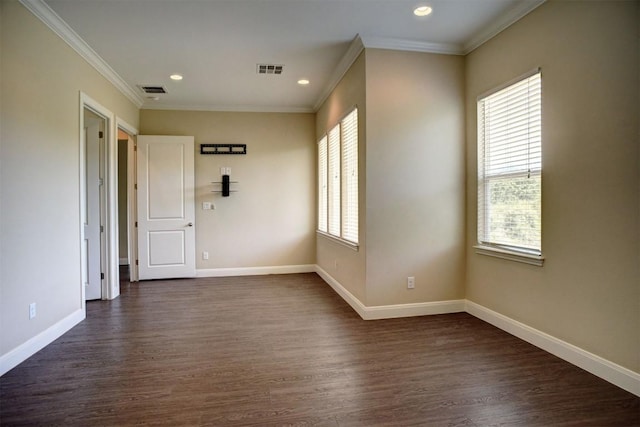 159 Alele Dr, Bastrop, TX 78602 - spare room featuring crown molding, dark wood finished floors, and recessed lighting