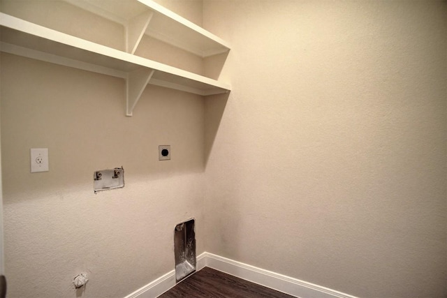 159 Alele Dr, Bastrop, TX 78602 - washroom with electric dryer hookup, dark wood finished floors, and hookup for a gas dryer