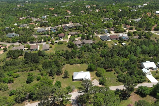 159 Alele Dr, Bastrop, TX 78602 - view of property location with a forest