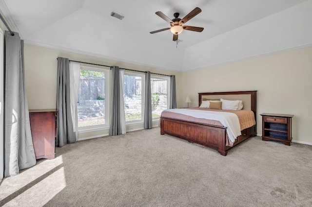 bedroom featuring carpet flooring, ceiling fan, lofted ceiling, and visible vents