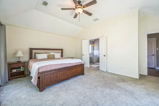 carpeted bedroom with visible vents, baseboards, ensuite bathroom, and lofted ceiling
