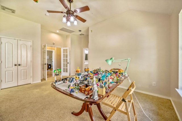 recreation room with a ceiling fan, baseboards, carpet, and visible vents