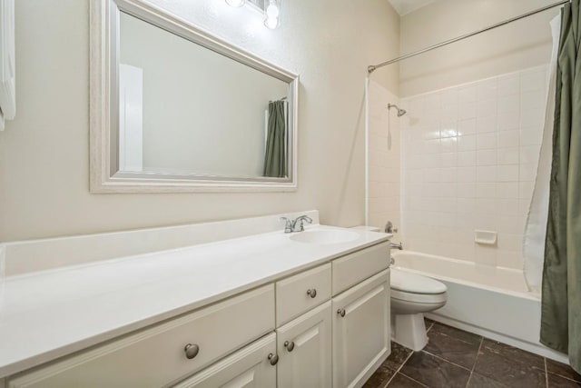 bathroom featuring toilet, shower / bath combo with shower curtain, and vanity