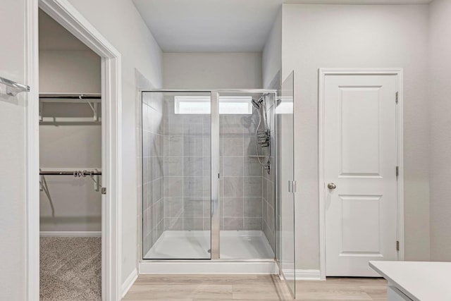 1528 Longhorn Ranch Dr, Leander, TX 78641 - full bathroom featuring a shower stall, vanity, and a walk in closet