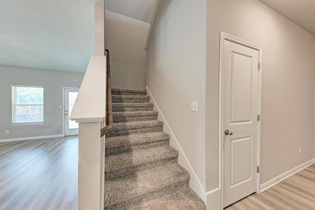 1528 Longhorn Ranch Dr, Leander, TX 78641 - staircase with wood finished floors and baseboards