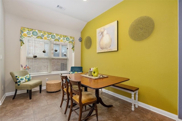 109 Lombardia Dr, Lakeway, TX 78734 - dining room featuring lofted ceiling and tile patterned floors